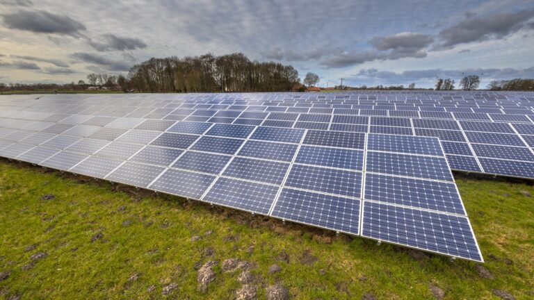 Field of solar energy panels clean energy background